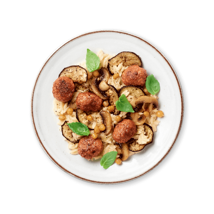 Griekse pasta met gegrilde groenten en vegetarische balletjes