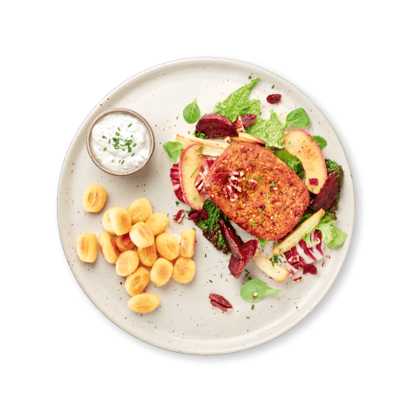 Herfstsalade met appel, hazelnootburger en gebakken gnocchi